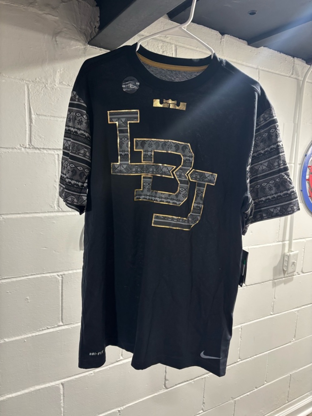 LeBron James LBJ Nike Black Short-Sleeve Graphic Tee with Gold Accent